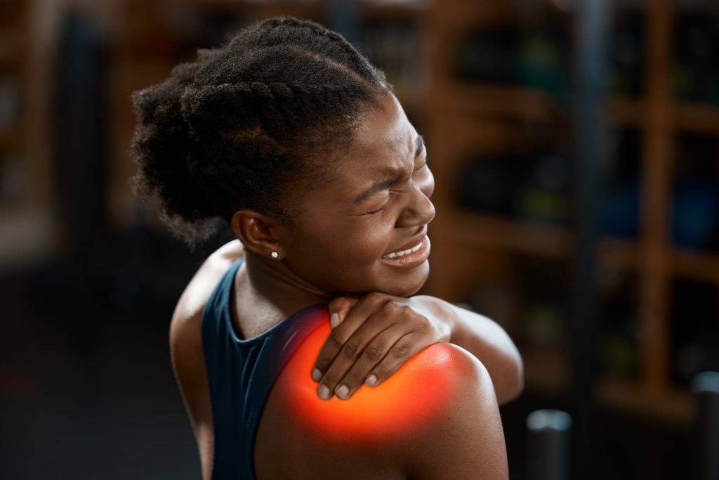 African American Woman With Shoulder Pain